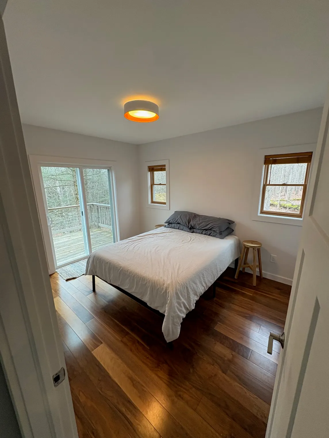 Freshly painted bedroom with the walls and ceiling finished.